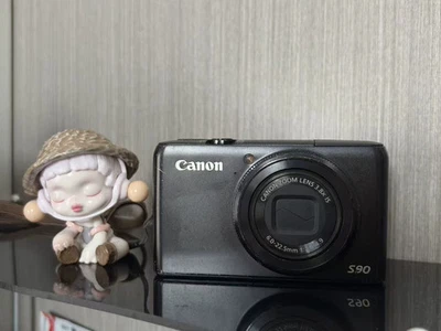 Cámara digital compacta Canon PowerShot S90 10,0 MP 15x zoom óptico negra Foto 1 de 4