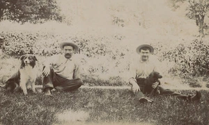 2 MEN IN THE GRASS W/ DOGS VINTAGE 3.5X5.5 PHOTO - Picture 1 of 3