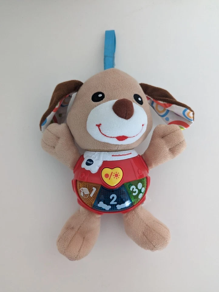 Vtech Melodienhündchen 6M+ Baby Kleinkind Musik Kuscheltier Hund Stofftier - Bild 1 von 1