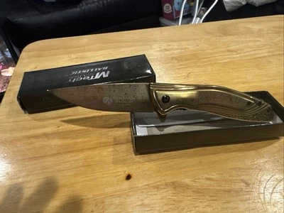 Cuchillo de oro balístico M Tech USA Foto 1 de 4