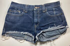 Levi's 511 Skinny Damen Größe 34 abgeschnittene Jeans dunkel gewaschen freiliegende Taschen gestreift
