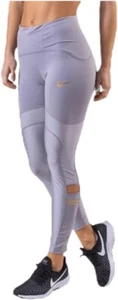 Leggings deportivos Nike plateados gris dorado talla S Reino Unido 8-10 velocidades 7/8 glamorosas - Imagen 1 de 10