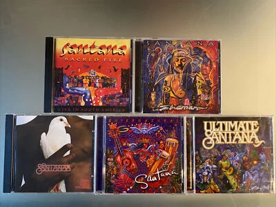 Santana 5 💿 LOT: Sacred Fire, Shaman, Ultimate, Supernatural, Greatest Hits VG Foto 1 de 4