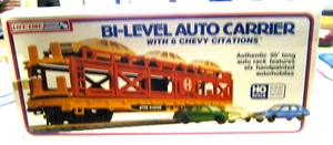 Life-Like HO # 8089 Bi-Level Auto Carrier 50' w/ 6 Vintage Automobiles. NIOB - Imagen 1 de 2