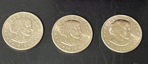 (3) Lote de monedas SBA Susan B Anthony 1er año SBA moneda de $1 1979 D 1979 P 1980 P LEER - Imagen 1 de 2