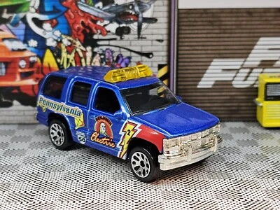 Hot Wheels Matchbox Chevrolet 97 Chevy Tahoe Benjamin Electric New Diecast 1/64 - Image 1 of 4