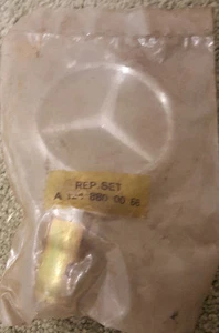MERCEDES BENZ HOOD EMBLEM NEW IN PACKAGE A1248800068 - Picture 1 of 2