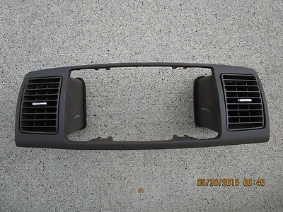 03-08 TOYOTA COROLLA LE S XRS 1.8L I4 EFI TABLERO RADIO BISEL EMBELLECEDOR MARRÓN Foto 1 de 3