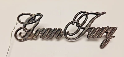 Used OEM Mopar Script Emblem 3811505 1975-1977 Plymouth Gran Fury (293) - Image 1 of 4
