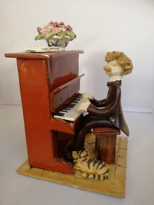 Laura Dunn man playing piano with cat pottery ornament  - Picture 1 of 10