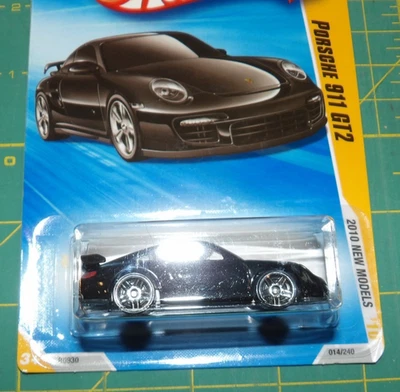 2010 Hot Wheels New Models - Porsche 911 GT2 - Black w/ Protector - Image 1 of 3