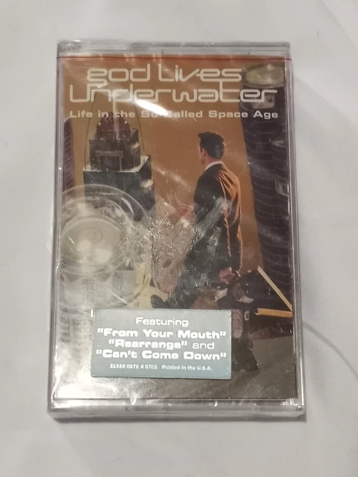 God Lives Underwater Life In The So-Called Space Age (1998) Sealed Cassette - Image 1 of 2