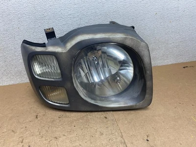 Faro lateral derecho pasajero Nissan Xterra 2002 2003 2004 OEM P6781 DW Foto 1 de 4