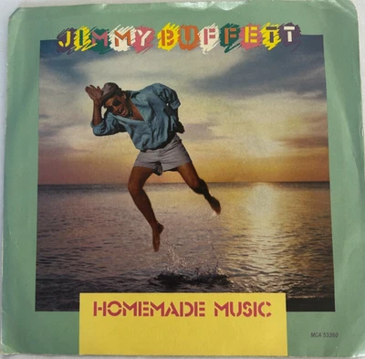 Jimmy Buffett - Homemade Music / L'Air De La Louisiane 7" MCA 1988 Pic Sleeve VG Foto 1 de 4