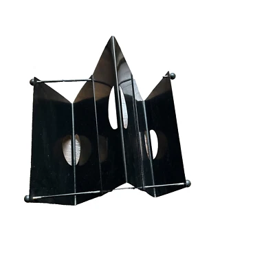 Revista de metal pintado negro Memphis Milano años 80 Foto 1 de 4