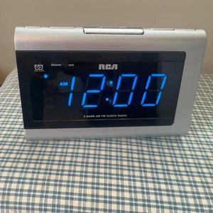 RCA RP5430 Dual Wake AM/FM Clock Radio 1.4” LED Display & SmartSnooze – Silver - Picture 1 of 7