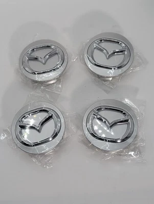 4 Mazda Press On Hub Cap Center New - Image 1 of 3