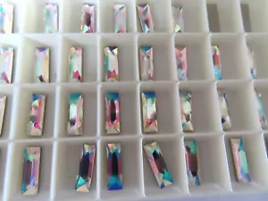 12 Swarovski Cosmic Baguette Flatbacks 15x5mm Crystal AB. #2555 - Picture 1 of 2
