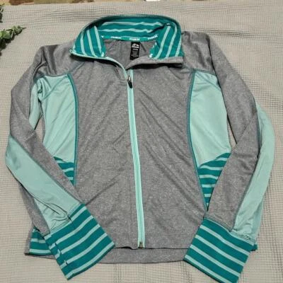 Chaqueta deportiva Reebok cremallera completa en verde azulado y gris, niños talla L Foto 1 de 4