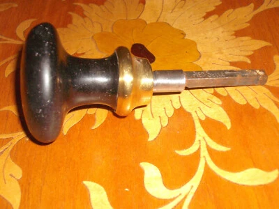 Ancienne poignée de porte en fonte noire "Pied-selle" - Photo 1/4