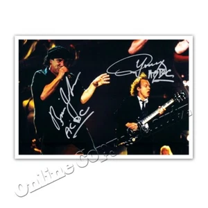 ACDC signiert Angus Young & Brian Johnson - Autogrammfotokarte / autograph - Bild 1 von 1