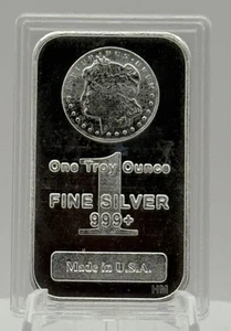💰1 oz Silver Bar .999 Fine – Highland Mint – Morgan Head in Acrylic Hard Case! - Bild 1 von 2