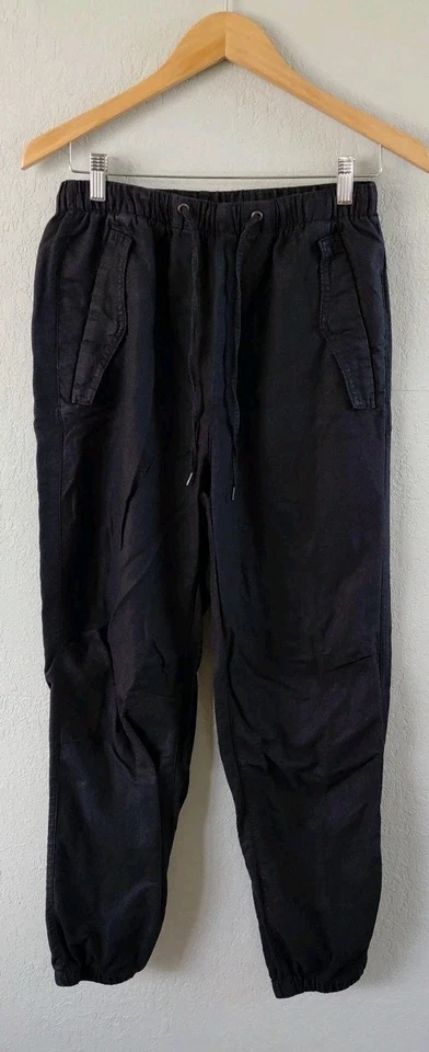 Pantalones de chándal Gap negros de lino y algodón con cordón para mujer talla pequeña alta cómoda Foto 1 de 4