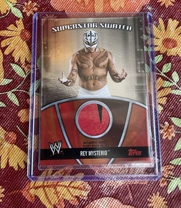 Topps 2010 WWE Superstar Swatch Rey Mysterio 2 color shirt - Picture 1 of 2