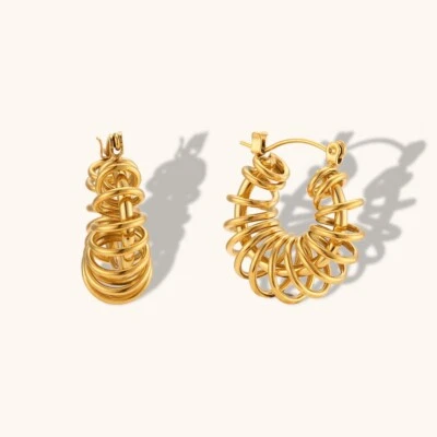 Pendientes de aro de acero inoxidable enchapados en oro de 18 quilates para mujer joyería de cuerda hueca Foto 1 de 4