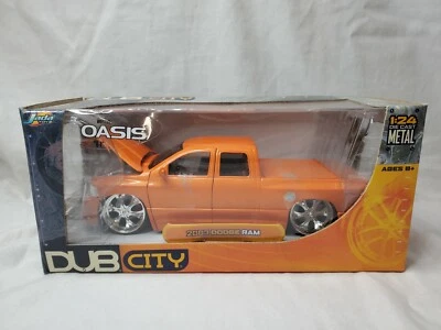 JADA TOYS 1:24 DUB CITY 2003 DODGE RAM ORANGE VERSION - Image 1 of 4