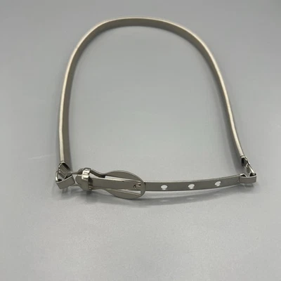 Cinturón elástico de malla metálica plateada de los años 70 cierre de hebilla discoteca glamour cintura ceñido Foto 1 de 4