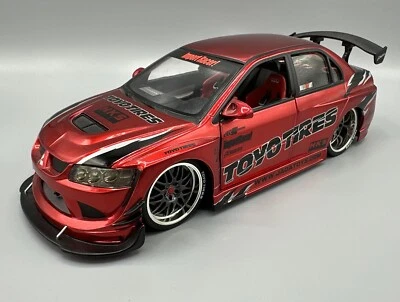 Jada Toys Import Racer escala 1:18 rojo Mitsubishi Lancer Evolution VIII sin caja Foto 1 de 4