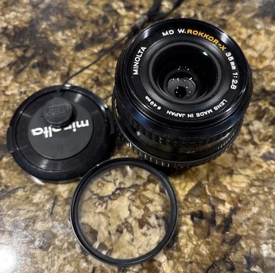 Lente gran angular de montaje Minolta MC W Rokkor-X f=24 mm 1:2,8 MC hecha en Japón usada en excelente estado Foto 1 de 4