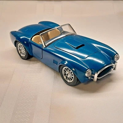 Coche modelo Burago Shelby Cobra 427 diecast 1:24 en azul metálico Foto 1 de 4