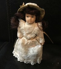 muñecas de porcelana articuladas