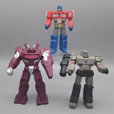 Lote de figuras TRANSFORMERS TITAN GUARDIANES Megatron Optimus Prime SHOCKWAVE Foto 1 de 4