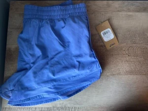 Pantalones cortos de running para mujer ASICS NUEVOS CON ETIQUETAS azul periwinkle - talla XL - Imagen 1 de 5
