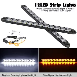 Par de luces fluidas 12 LED intermitente de flecha blanco DRL + lámpara de señal de giro ámbar - Imagen 1 de 8