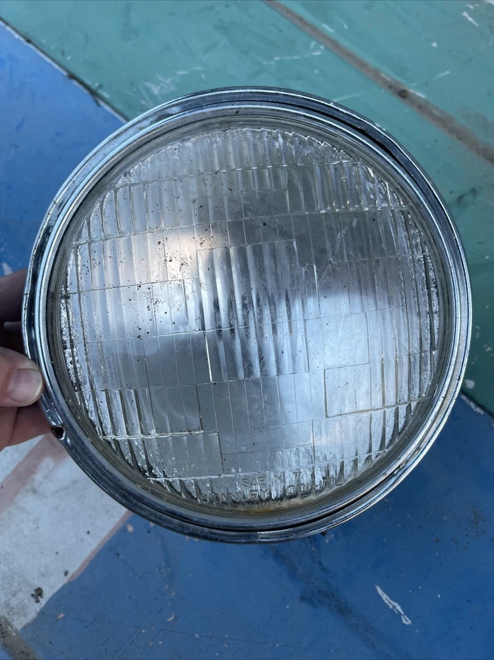 Faro vintage Kawasaki KZ KZ750 Stanley 001-0799 SAE M7 001-1014 KZ900 Z1000 Foto 1 de 4