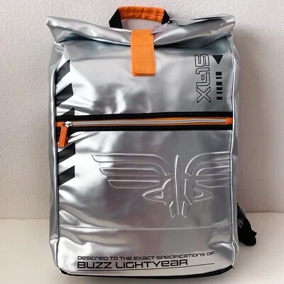 Mochila grande futurista cromada naranja detalle neón Foto 1 de 4