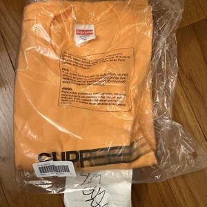 Nuova maglietta con logo Supreme Motion arancione pesca nera a mano spedita ora taglia XL - Foto 1 di 1