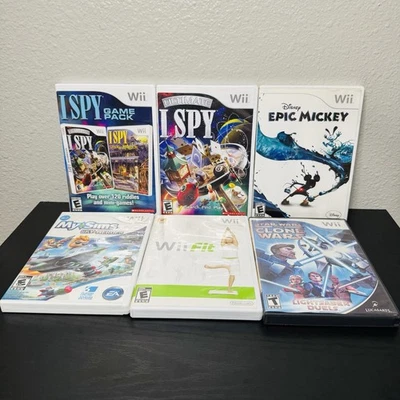Nintendo Wii Game Bundle Lot of 6- I Spy Game Pack  Epic Mickey Star Wars Sims - Image 1 of 4