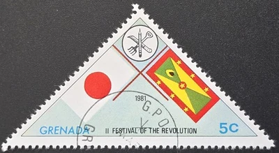 Granada - 1981 Scott 931 II Festival da Revolução Bandeiras Japão e Granada - Imagem 1 de 3