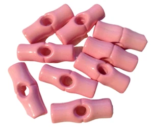 8 x 25mm Plastic Toggle Buttons in baby pink. - Picture 1 of 1