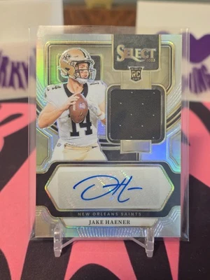 2023 Panini Select - Rookie Signature Memorabilia Jake Haener Silver Prizm /199  - Image 1 of 2