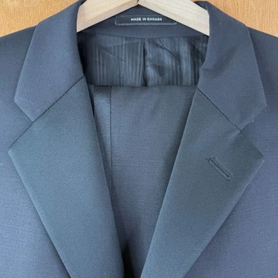 Pantalones de esmoquin Calvin Klein para hombre 42R negros 3 botones 100 % lana 34x28 plisados delanteros Foto 1 de 4