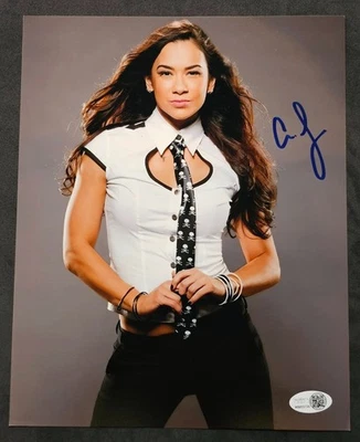 Foto firmada por AJ LEE 8x10 lucha libre autógrafo luchador automático metálico certificado de autenticidad WWE JSA Foto 1 de 3