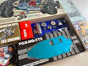 KIT TELAIO TAMIYA 1/8 RC 4WD TGX-MK.1 TS CON OPEL CALIBRA CLIFF SET RICAMBI CARROZZERIA - Foto 1 di 8