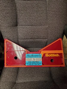 Gottlieb "THE Games"  Pinball Machine Playfield Metal Apron Instruction Bowtie - Picture 1 of 4