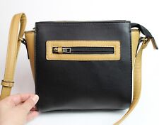 NWT TravelSmith RFID Crossbody Bag Black Tan Faux Leather Zip Top Gold Hardware